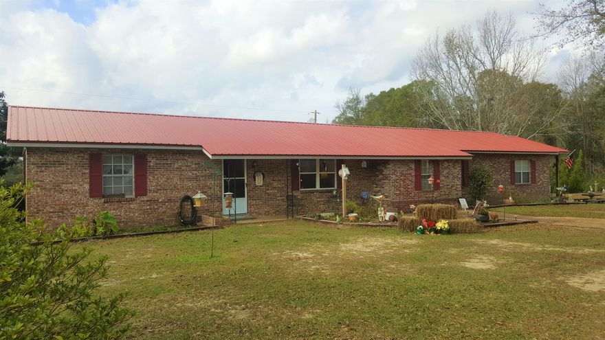Need more space? With over 2400 sq ft heated and cooled area and 8.45 acres of land, this home has the space you need. Enter to find an open floor plan to include a 22x16 bonus room addition off the kitchen area. If this isn't enough to sway you, you will love the over-sized master bedroom suite. This area has a bonus sitting room, laundry room, full bath, wet bar, walk-in closet, and a large office/additional closet. Outside features include a large deck, pond with island, and a workshop that could easily be converted to a guest home. Bonus: A/C and dishwasher are 1-2 years old, and metal roof and washer & dryer are brand new.