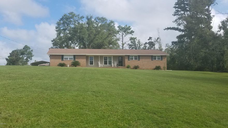 CURRENTLY UNDER CONTRACT, SELLER ACCEPTING BACKUP OFFERS! Looking for the perfect home in the perfect neighborhood?? Well look no further than this 3 Bedroom 2 Bath home in Marianna.  Brick home with 1638 square feet under air located at the end of a dead-end street sitting on a beautiful 1 acre lot. Wood and tile floors throughout with no carpeting in the home! Relax on the deck overlooking the beautiful backyard with plenty of room for the kids to play!