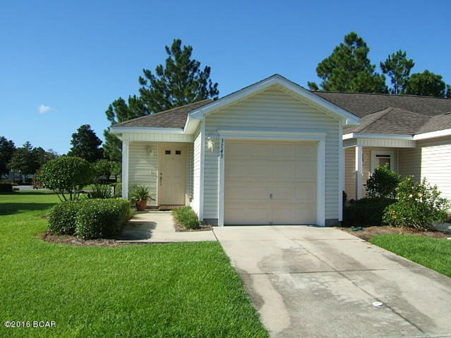 Beautiful townhome located in the Hammock's Subdivision. Quiet landscaped and sidewalked neighborhood with signed entrance close to schools, dining, and entertainment in the heart of Lynn Haven.Community room, pool, and grounds keeping are included in  HOA fee. End unit offers large yard on one side. (No neighbors next door). Screened back porch.