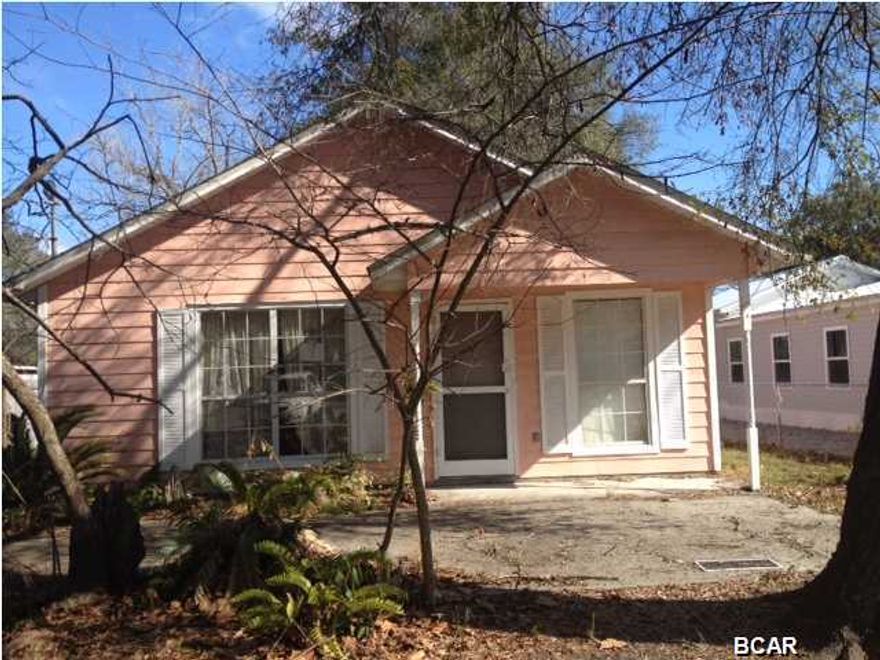 This 2 bedroom, 1 bath cottage style home is located close to shopping, restaurants and convenient to downtown Panama City. Vaulted ceilings in the living room, features an open kitchen-dining area and a very large master bedroom you don't normally see in this size home. Home does need some TLC and this would be a good investment rental property. Property is being offered AS-IS. Seller acquired property through foreclosure and offers no disclosures and/or warranties. Buyer responsible for costs of deed transfer costs. All information and measurements should be verified by buyer if important. Square footage taken from tax data.