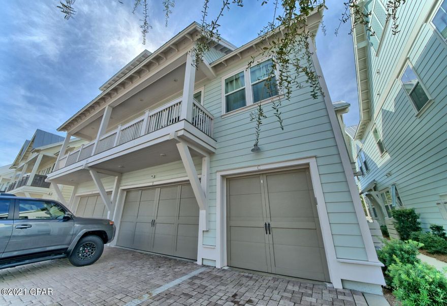 Welcome to a gorgeous luxury townhome at the Prominence resort on East 30A! The location of this home is ideal, being near the entrance and a quick golf cart ride to the beach or short walk to the popular ''HUB'' which consists of 3 acres of a variety of restaurants, bistro bars, specialty shops, galleries and boutiques and live music. The Golf Cart is included with the property and has all new batteries!..and the large resort style pool is only steps away. 30A is known for miles of biking trails and state parks.

The open living space has a bright and elegant feel with a wall of windows leading out to the large balcony and 10ft trey ceilings with crown molding and LED lighting.  Comfortable furnishings include a large sectional couch facing a TV above a white credenza. The kitchen appliances are all stainless and includes a gas cooktop stove with 5 burners. The floors are wood throughout with tiled bathrooms floors. The master shower is over sized and tiled with an atrium window for extra daylight. This unit has been meticulously maintained and is currently a non-rental unit, but would make a great rental or perfect home. Extra parking is available by the pool.
All measurements are approximate.