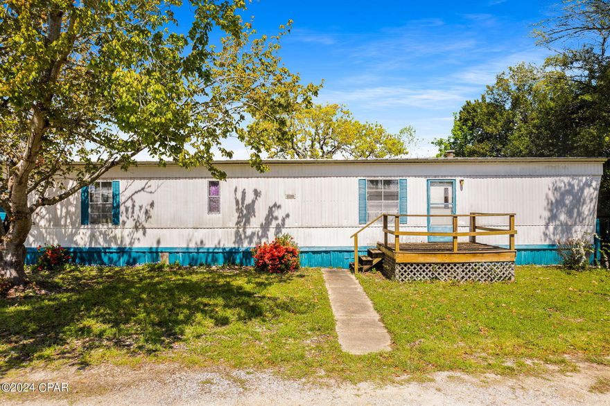 ''CURRENTLY UNDER CONTRACT, SELLER WILL CONSIDER BACKUP OFFERS.'' Fantastic location on the coveted West End of Panama City Beach. Located just blocks to the white sandy beaches and emerald waters! 2-bedroom 2 full bath fully furnished mobile home has been very well maintained. Features include a detached two-car garage, large Florida room, new Bahama shutters, brand-new front door (ready to be installed), new appliances, new ceiling fans, new light fixtures and precut hurricane boards for the exterior. This would make a great beach pad or permanent residence. Huge 96x100 ft lot, located on a dead-end road with no through traffic. Close to Thomas's Donuts, Carousel grocery store, 30A, Pier Park & the stunning emerald beaches! Laguna Beach is a Golf Cart friendly, laid-back Community and truly its own vibe! Cash deal only. Call today to schedule a showing.