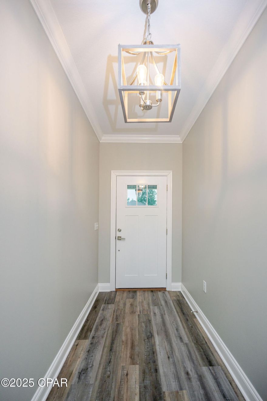 ***VA Assumable loan!!! With a 3.25% interest rate*** 

Welcome to this beautifully designed, like-new 3-bedroom, 2-bathroom home that blends comfort, style, and quality craftsmanship. Step inside to find a spacious open floor plan with luxury vinyl plank waterproof flooring throughout, LED recessed lighting, and stunning upgraded fixtures. The Great Room features a striking tray ceiling and crown molding that extends into the dining area and kitchen, creating an elegant atmosphere for everyday living and entertaining.

The kitchen is a chef's dream with a center island, custom cabinetry, quartz countertops, stylish backsplash, walk-in pantry, and upgraded stainless steel appliances. The master suite is a true retreat, with a barn-style sliding door leading to a spa-like bath featuring a double vanity, garden tub, large cultured marble shower, and an oversized walk-in closet.

Enjoy outdoor living on the large, covered back porch—perfect for entertaining family and friends. Exterior features include 90% brick construction with Hardie board accents, a 2-car garage, fenced yard, and an irrigation system to keep your lawn looking its best.

Note: All measurements are approximate and details believe to be accurate. Buyers should verify if important