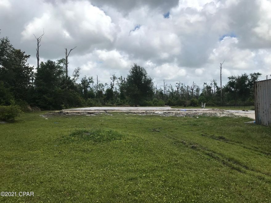 1 acre residential land located near Eastern Shipbuilding on Hwy 2297. Parcel has septic, deep well and electricity. Home has been demolished  and removed after hurricane, but slab remains.  There is a small pond in the front part of the property.