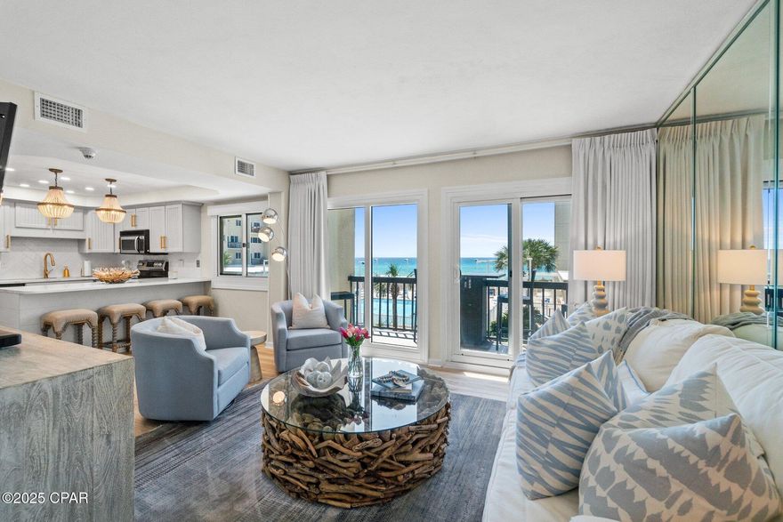 Exquisite FULLY RENOVATED and NEVER RENTED Second Floor Condo with Designer Finishes and Spectacular Views of the GULF! Step into luxury with this meticulously updated, FULLY FURNISHED, second-floor condo, where every detail has been thoughtfully crafted. Enjoy breathtaking Gulf and pool views from your serene living space. The stunning designer finishes throughout create a modern yet inviting atmosphere, perfect for relaxation and entertaining. 
Nestled on the shores of the Gulf and Lake Powell (largest Coastal Dune Lake in North America) this exceptional complex offers an array of amenities including, two seasonal heated swimming pools, four state of the art lighted tennis courts, shuffleboard, saunas, picnic pavilions and boat slips!