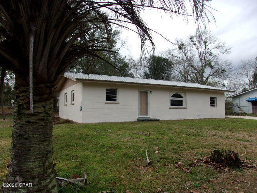 4 bedroom 1 bath block home on large lot in city limits of Bonifay.  Metal Roof.  Home has been remodeled. New paint and almost everything in side is new to include paint, floor covering, counter tops, doors, bathroom remodel and all new appliances. Stove, Refrigerator, Microwave, dishwasher, washer and dryer. Open concept. Split bedrooms. Move in ready. Great place for a big family. Walking distance to town and churches.  Short distance to schools. Check it out today!!!