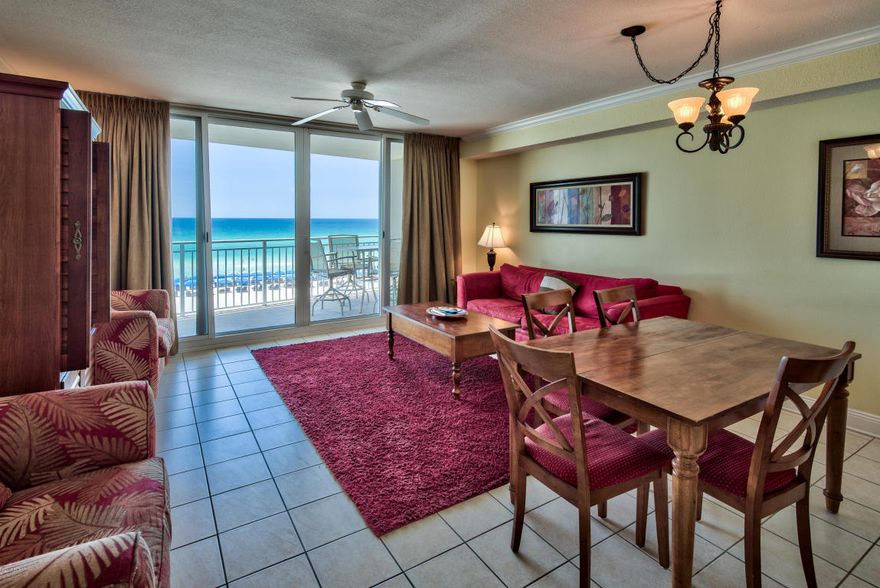 Located just over a mile east of shopping, dining, & entertainment at Pier Park is Emerald Beach Resort Condo. Set along nearly 800 ft of beach front along the Gulf of Mexico in NW Florida on the grounds of a five-star waterfront resort, it features access to luxurious amenities that include multiple pools, an exceptional fitness center, Starbucks, valet parking, and 24-hour security. The building features an enclosed walkover with upscale Sky Bar lounge. Jet ski and parasailing rentals are offered on site seasonally. Easy care tile floors carry throughout the entirety of this gulf front unit with hall bunks, and crown molding adds a finishing touch. Its kitchen with bar seating is appointed with contemporary raised panel cabinets, granite counters, and stainless steel appliances.