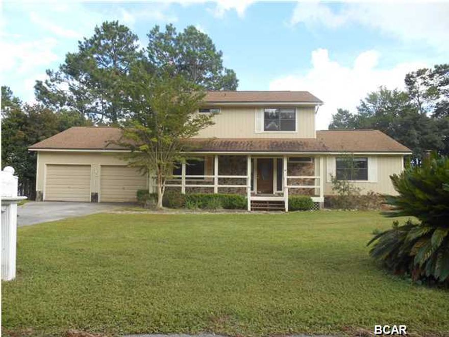 Wow! What a drastic price reduction...Here's your opportunity to own a lovely waterfront home, with its own dock, gorgeous views and great floorplan. In addition to the 4 bedrooms, ther is a huge separate dining room with hardwood floors, that would make a great office, plus a large landing at the top of the staircase, perfect for computer/homework space AND a pretty, tiled sunroom with french doors that lead from the living room. Three of the four bedrooms have a great view of the water, and the upstairs master bedroom has its own bath with double vanities. The beautiful lawn gently slopes to the water and is picturesque for parties, family get-togethers or just lots of friends who are boating enthusiasts or avid fishermen. This parcel is directly on Callaway Bayou, known for its