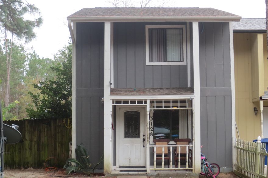 Attractive Townhouse features an open floor plan, 2 large carpeted bedrooms, an office, a bonus room, tiled floors throughout the bottom story, a convenient 1/2 bathroom downstairs and an efficient kitchen. The kitchen boasts ample counter space and cabinets, a built-in pantry, and a large breakfast bar. The bonus room and the office are adjoining and can be used to meet any of your needs. Seller is in the process of renovating the office new carpet and new paint.  The exterior features a privacy fenced-in side/back yard, a large front yard with a white picket fence, a covered front porch, a yard building for added storage and 3 parking spaces. This home has a lot to offer, new roof in 2014 and all new carpet this year. Call today for your own private preview.