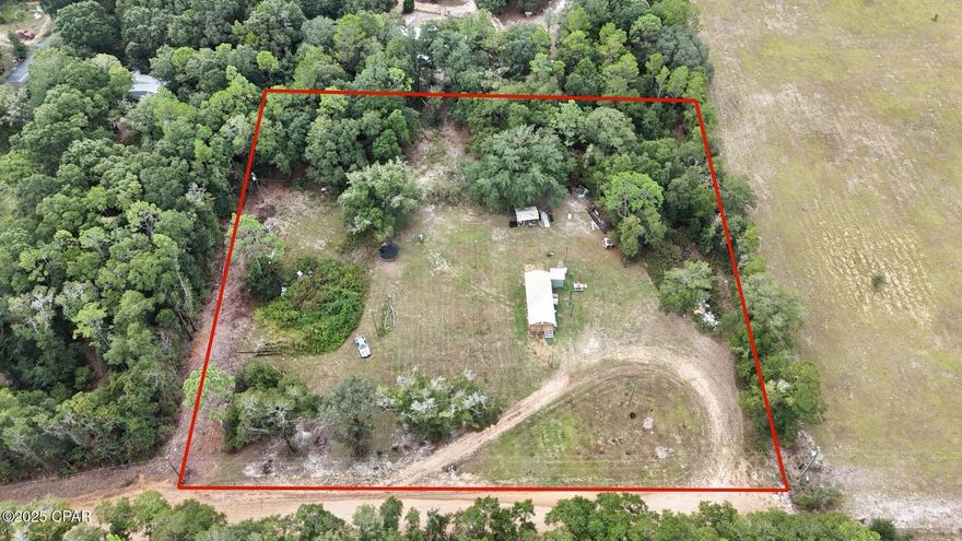 2.5 Acres - Ready for Your Dream Home!

Discover peaceful country living on this 2.5-acre cleared lot, perfectly situated near some of Florida's most beautiful lakes including Crystal Lake, Compass Lake, and several surrounding lakes. This property is ready for your new home, featuring a well and septic system already in place, saving you time and money in development.

Enjoy the tranquility of rural living while remaining conveniently located just 32 miles from Panama City Beach, FL, offering easy access to shopping, dining, and the Gulf Coast's white sand beaches.

Contact your agent today to schedule a showing and explore the possibilities this property has to offer.