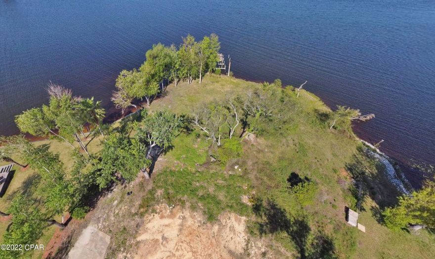 Fantastic lot on Deer Point Lake, nearly an acre and ready for your new home. Beautiful sunset views across the 270' of lakefront shoreline.

 Previous home has been removed, there still is an existing boathouse that was damaged in HM, also well and septic on site that were working while owners were there, although currently not guaranteed. 

Woodmere is a great neighborhood and the lot is located at end of a quiet Cul-de-sac.