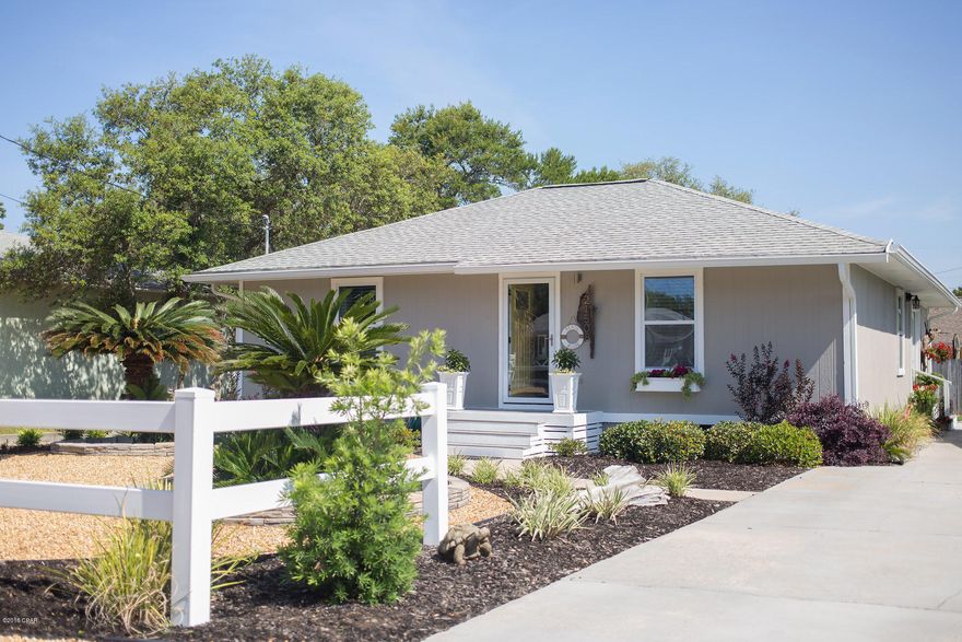 **WALK TO THE BEACH** This gorgeous, fully furnished beach cottage is just a short stroll to the beautiful sugar white sands of the Gulf of Mexico. It is in FANTASTIC CONDITION after undergoing a complete transformation just two years ago. Windows, doors, plumbing, electrical, walls, floor and appliances were ALL redone. Spend more time near the water instead of on chores with this low maintenance yard. Located right between Pier Park and Inlet Beach/30A.