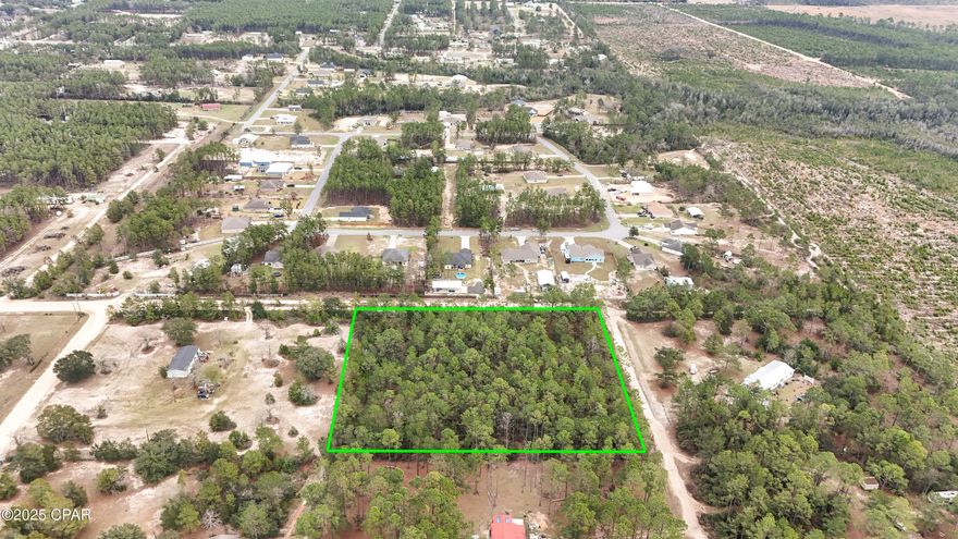 UNDER CONTRACT! ACCEPTING BACKUP OFFERS! Build your dream home on this quiet wooded 3.3 acre corner lot close to Dean Bozeman High School across Hwy 77 from Lake Merial just south of Hwy 20.