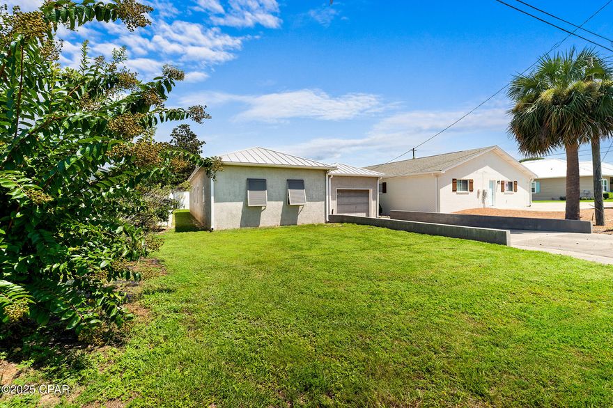 CURRENTLY UNDER CONTRACT, SELLER WILL CONSIDER BACKUP OFFERS. All you need are your flip-flops and a beach bag, the sugar-white sands and emerald waters of Panama City Beach are calling! Whether you're searching for a full-time coastal home, a vacation retreat, or a solid short-term rental, 21504 Palm Avenue delivers the whole package.
This fully furnished 3-bedroom, 2-bath charmer also features a flexible bonus room, perfect for an office, guest space, or playroom. The backyard is partially fenced for privacy, while the wide-open front yard gives you that easy breezy coastal vibe.
The seller is making several improvements, including, updated exterior drainage, a new side entry door to the flex room, and a brand-new electrical panel which is a major upgrade from the previous Challenger panel.
And the location? Less than half a mile to the beach. Walk, bike, or take the golf cart straight to some of the most stunning shoreline on the Gulf. You're also just minutes from Pier Park, Top Golf, Pirates Voyage, great restaurants, shopping, and only 15 minutes to 30A and Rosemary Beach.
This is your opportunity to own a turnkey slice of paradise in one of the most desirable beach towns on the Coast. Don't wait, call your favorite Realtor today!