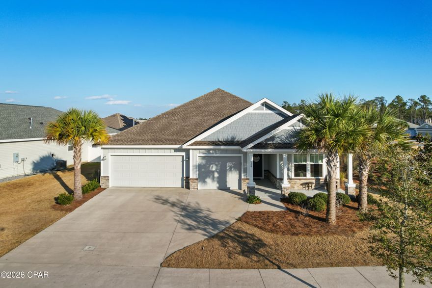 Located in the highly desirable Breakfast Point community of Panama City Beach, this 4-bedroom PLUS office with closet, 3-bath home offers 2,162 square feet of thoughtfully designed living space. A welcoming foyer opens to a spacious great room with high ceilings and an open-concept layout, complemented by a split-bedroom floor plan for added privacy.  The kitchen is both stylish and functional, featuring a large center island with breakfast bar, custom soft-close cabinetry, stainless steel appliances, a gas range, designer backsplash, pantry, and a stainless-steel apron-front sink. Durable LVP flooring flows seamlessly throughout the home.  The master suite showcases a tray ceiling and a luxurious en-suite bath with a double vanity, tiled shower, and an oversized walk-in closet. Three additional bedrooms provide convenient access to full baths, while the dedicated office offers flexibility as a fifth bedroom, playroom, or media space.  Exterior highlights include a 3-car garage, covered front and rear porches, and a screened back porch accessed through a large sliding glass door - perfect for indoor/outdoor living. The charming front porch overlooks a peaceful pond. The backyard is fully fenced with white vinyl fencing and includes a Rain Bird sprinkler system for easy maintenance.  Ideally situated next to a park within this sidewalk community with underground utilities, Breakfast Point offers quick access to the white sandy beaches of the Gulf, a nearby Publix-anchored shopping center, Breakfast Point Academy (within walking distance), and Pier Park for premier shopping, dining, and entertainment.  Call today to schedule your private showing and start enjoying the coastal lifestyle!