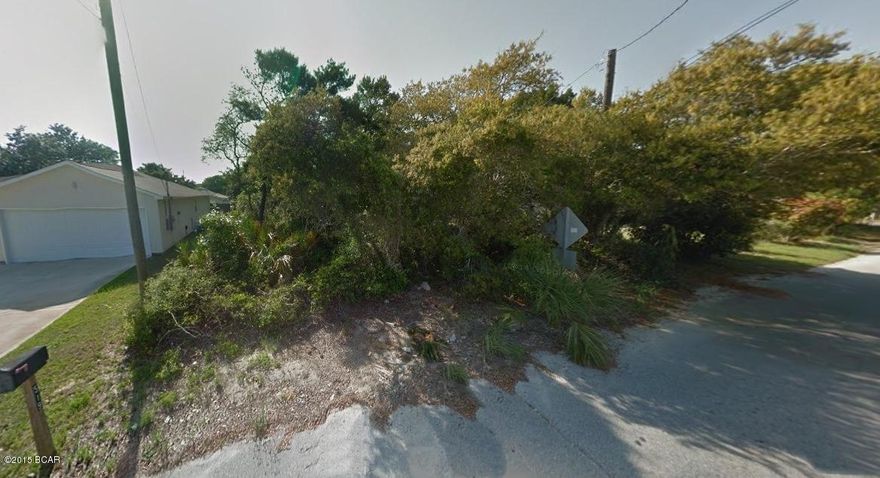 Great building lot just two blocks from the beach.  This 50x100 lot is also near the Maggie Still Community Park and walking distance to Beach Elementary School.  Perfect for building a beach abode for a full-time residence or as an investment.  City water and sewer available.  All info is approx. and must be verified by Buyers if important.