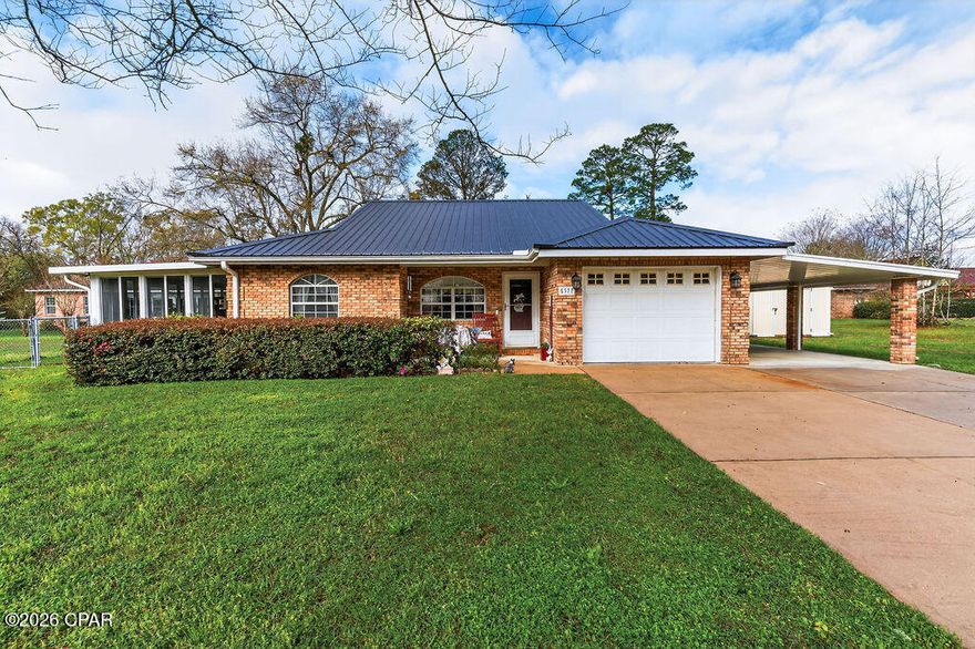 This move-in-ready home is nestled in a quiet neighborhood within the city limits of Graceville and offers the convenience of being within walking distance of The Baptist College of Florida. Inside, you'll find thoughtful features and comfortable living spaces designed for everyday enjoyment. A spacious sunroom provides the perfect spot to relax, unwind, and enjoy a good book while taking in the natural light.

The home includes several convenient upgrades, such as separate water heaters located under the kitchen and master bathroom sinks, remote-controlled lighting in the master bedroom, and electrical outlet switches in both bathrooms for added functionality. The enclosed garage provides additional versatile space, while an outbuilding offers plenty of room to store outdoor equipment, tools, or hobby items.

With its combination of comfort, convenience, and unique features, this well-maintained property is ready for its next owner to move in and enjoy.