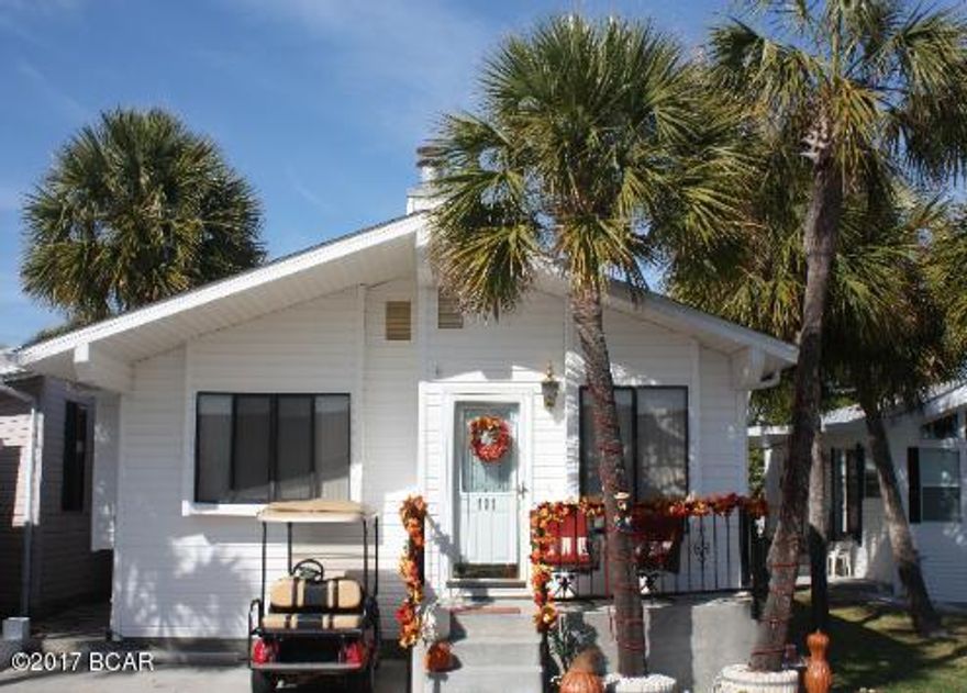 Look no further, this is the one you've been searching for! Check out this fabulous 3 bedroom 2 bath Venture Out home.  The rooms are large and the home has a great flow. The front porch is perfect for relaxing after a long day on the beach. This home is on a rental program and has a fantastic rental history. Hurry this one won't be around long! Venture Out has 300' on the beautiful pristine beaches of the Gulf of Mexico and 1,000' on the Grand Lagoon. The resort includes wonderful amenities and there's really no where else like it