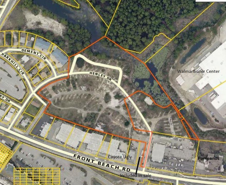 BANK OWNED * previously SOLD FOR $3 MILLION. Approx 6.4 acres of Prime Land right in the middle of the Beach just behind Walmart with a small lake. Approx 4.8 acres of uplands.  Zoned commercial and would also make a great residential development or hotel.The building on Front Beach has no value but could be renovated for a Sales Center and then a commercial rental. There is a lake in back also. Located directly across from Long Beach Condos behind Walmart and next to Pompanos.