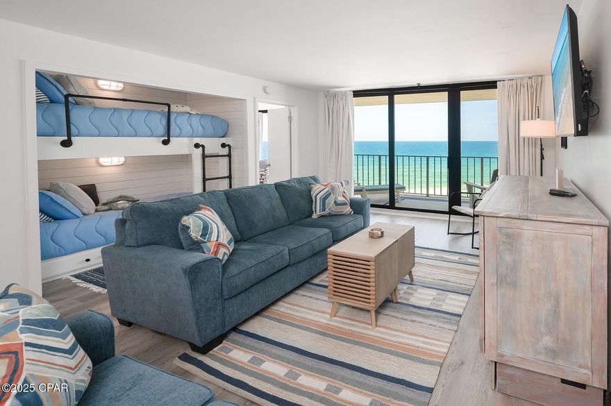 Completely renovated, stunning 9th-floor condo featuring Gulf views and a spacious layout. There are very few units like this ~ expanded 1 Bedroom Deluxe, that sleeps 6 for maximizing occupancy and profit.  This unit  offers two full bathrooms, each upgraded with newly tiled walk-in showers and rainfall showerheads. The large primary bedroom includes a king bed, smart TV, an en-suite bath with walk-in shower, and floor-to-ceiling windows showcasing Gulf views. A sitting area by the window provides an ideal spot to relax and enjoy the scenery.
The living area features custom built-in, beach-themed bunk beds added this spring—each with individual lighting and USB/power outlets. A furnished balcony overlooks the Gulf, pool deck, and stunning sunsets. Edgewater Beach & Golf Resort is centrally located in Panama City Beach, offering convenient access to nearby shopping, dining, Pier Park, and St. Andrews State Park.

Edgewater Beach & Golf Resort is Panama City Beach's only full-service resort, featuring a par-3 executive golf course, basketball courts, pickleball, shuffleboard, tennis facilities, 11 pools (10 heated seasonally), 4 Gulf-front hot tubs, onsite dining options, and more.