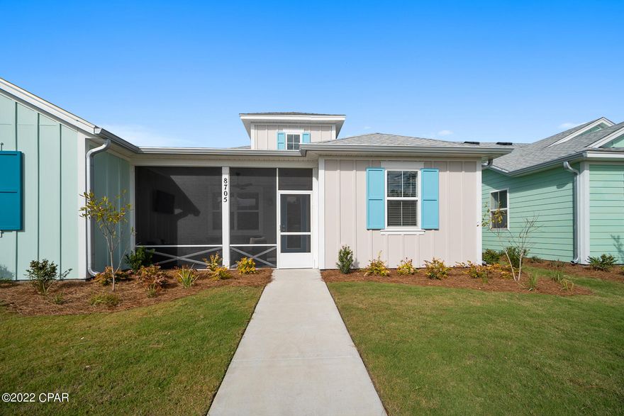 Latitude Margaritaville is always 5 o'clock!!!! This well appointed Camelia model offers so many upgrades so no need to wait 2 years. Move in now!!! As you enter the upgrades are evident... greeted first by screened porch with epoxy floor then see the living room shiplap wall and beams, ceiling speaker system, 65'' Samsung & soundbar, Kitchen boats extended island, L4 quartz countertops, cabinets L3 42'' cabinets, pullout shelves & pots/pans drawers, and more... Main bed is spacious with 50'' TV, bath L3 floor, L5 brick lay tile to ceiling, L4 quartz, seamless shower enclosure. Second bedroom is also recessed lighting with 50'' OLED TV mounted, bathroom L4 quartz, L3 tile floor, L5 tile to ceiling. L5 laundry floor. Recessed lighting throughout. TV's convey. Verify measurements if impo