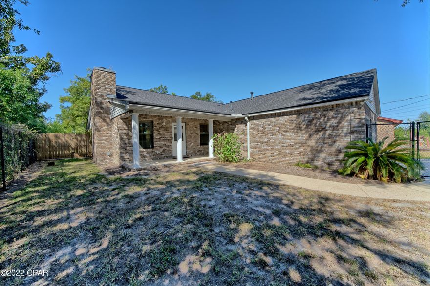 Been dreaming of buying a home in Panama City? Ready for easy living and want room to park your toys? This is it! Located near historic St. Andrews, and close to the bay, this 2BR/2.5BA single story brick home with solid surface flooring home throughout and large garage will soon be ready for a new owner! Enjoy the nearby sports fields (tennis, basketball, softball), dog park, walking trail, and recently updated nautical themed kid's playground at Oakland Terrace park, all with NO HOA fees! Privacy fenced backyard with gated access has room to store boat trailer, RV, 5th wheel, or make it your own relaxing oasis! Like technology?  Home is also equipped with thermostat, lighting, and security that can be controlled remotely.