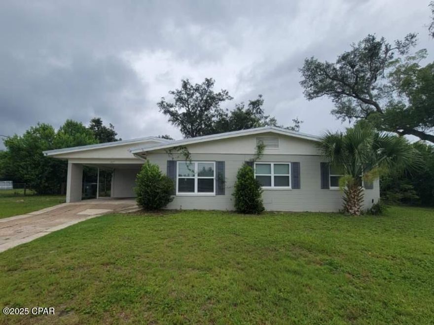 Located in Lynn Haven-This is a 3 bedroom, 2 bath home.  Features tile flooring throughout.  Freshly painted.  Equipped with range, refrigerator, dishwasher.   Charming screened porch. This property is situated on a spacious lot, with a fenced in yard and double side gate.  Convenient to pull in a boat, camper, trailer. Plus there workshop or shed with electricity.
 Just minutes from shopping, restaurants schools and parks.  Call to schedule to tour.