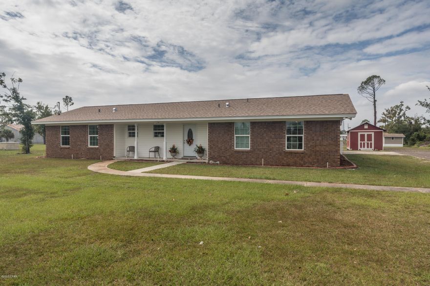 LOOKING FOR A HOMESTEAD in town? This beautifully remodeled and updated home on a large 1 acre lot just minutes to Tyndall AFB. is just what you're looking for! There are 2 sheds and a good size garden area ready to go for growing your own vegetables, flowers or herbs! Tons of room for Boat or RV storage, and just a short distance to the nearest public boat launch.  There are 4 bedrooms, 2 baths plus a small office space. This wonderful home is move in ready, everything is new: Luxury Vinyl Plank Flooring, Windows, Exterior Doors, Roof, Lighting, Kitchen, Drywall, Wiring, Service Panel, Garage Door, AC Ducts, Stove, Dishwasher and More! This is essentially a new home and everything has been done with an eye for detail. with energy efficiency in mind. Don't miss this one, it's a gem. Measurements are Approx. If important please verify. According to the owner the City of Callaway has given up the "alley right of way" at rear of property beyond the chain-link fence, this would add an additional 10 feet of depth to the property, please verify with the City of Callaway.