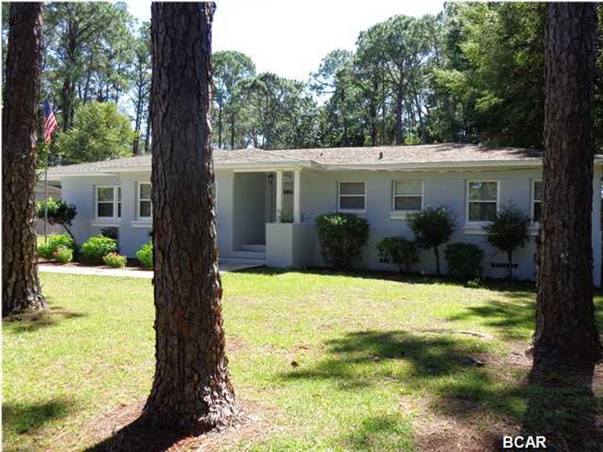 Don't miss the gorgeous Cove home. Completely renovated. The kitchen, sunroom and baths are tiled. The remainder of the house has the original hard wood floors that were refinished last week. They look great. The kitchen has been updated with granite counter tops and all fixtures, (lights and water) are new. The house has been freshly painted, both on the interior and the exterior.. This house has tons of storage. The kitchen has great storage, with a pantry as well as an abundance of cabinets. There is a deck on the back of the house with a hot tub. The back yard features a workshop with water and electric and a boat carport. Do not let this one get by. Make your appointment to see this beautiful home today.
