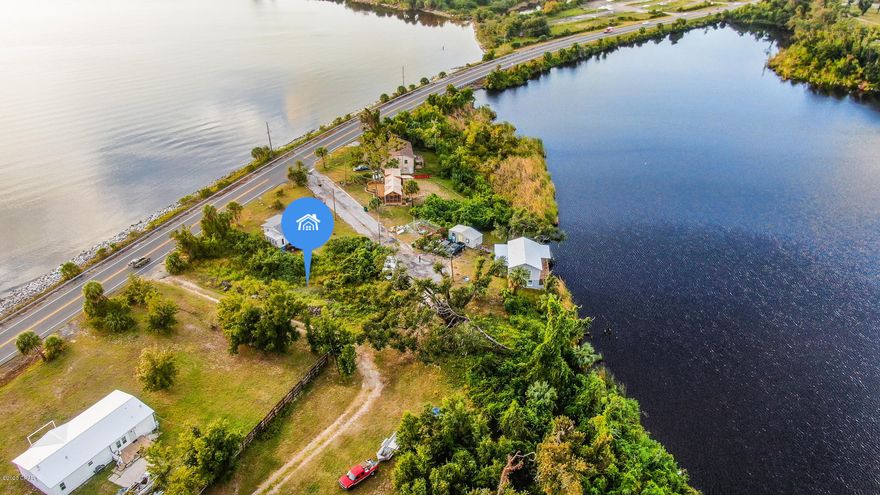 Great opportunity to build your dream home on the water in the quiet City of Parker!