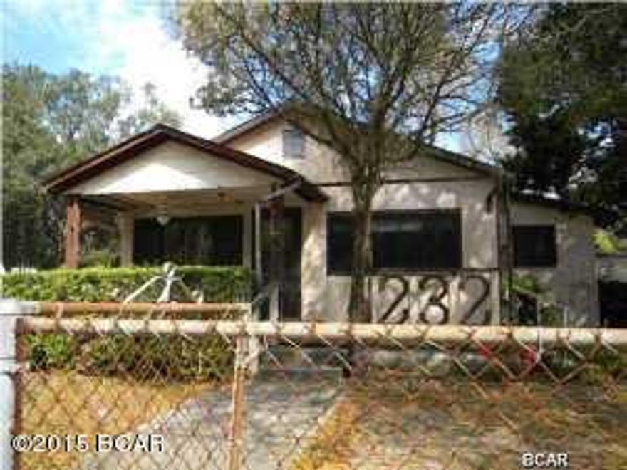 What a buy on this large sq ft home with 4 bedrooms for that large family, front porch to sit and watch the kids play, enclosed sitting area off of master bedroom great area for moms quiet time, and we didn't forget dad with a detached garage/workshop with electric.  Conveniently located to Tyndall AFB, hospital and all other amenities in area.  Needs flooring and paint to make this home your own.  Call your friendly agent today to see this home.  Won't last long at this price.