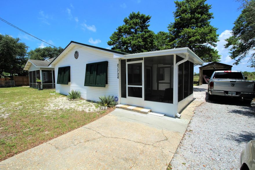 Charming Beach Cottage located in Riviera Beach on the West end of Panama City Beach. Cinder block home updated with tons of charm. Metal roof, newer central a/c, enclosed screen patio, and a huge man cave/out building complete with a BONUS full bathroom. Home has solid oak cabinets and tile floors.. LOCATION... CUTE... and it's a Golf cart community!

**all important listing data must be verified.