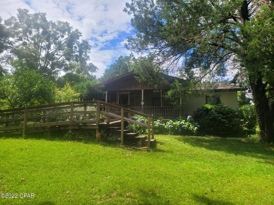 This 3/2 block home has lots of potential with a little tlc it could be a very nice home. This home features a large living room, Kitchen, dining room, utility room, laminate, vinyl, ceramic and carpet flooring.