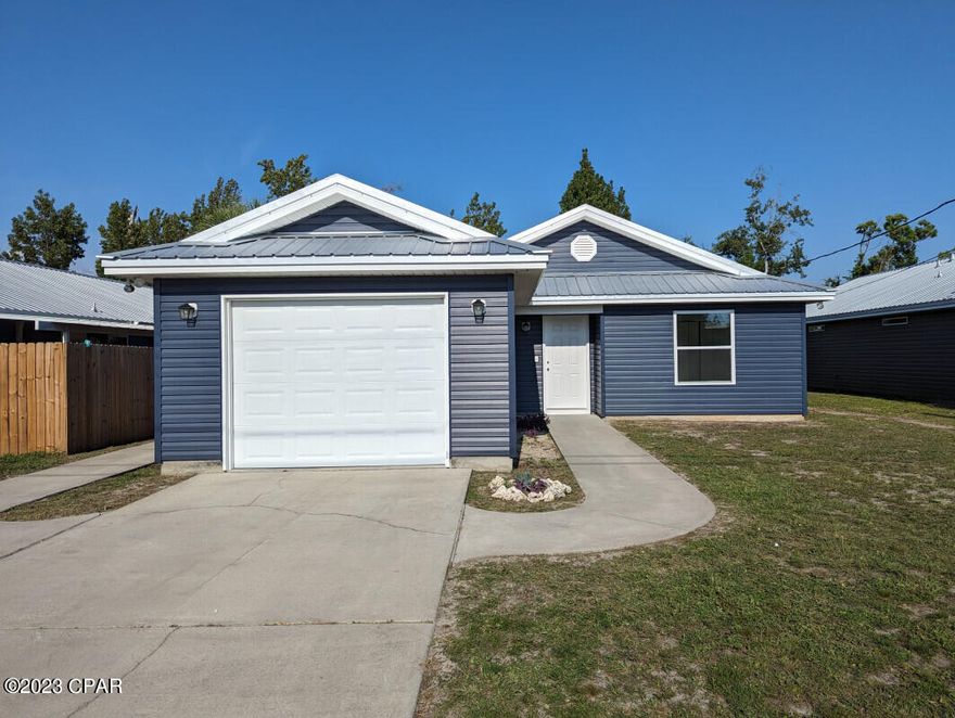 CURRENTLY UNDER CONTRACT, SELLER WILL CONSIDER BACKUP OFFERS. 3 Bedroom / 2 Bath. Exceptional Master Bedroom with Barn door, Bath with shower, and walk in closet. Oversized second and third bedrooms. New all plywood full height kitchen cabinets with slow close doors and drawers. Granite countertops. Stainless steel appliances including WiFi capable Range. All tile floors. Rinnai Tankless water heater (gas) LOW-e vinyl windows with Argon gas. 4 year old 26 gauge metal roof with radiant barrier underlayment. Spray foam attic insulation. New electrical service and breaker box with all AFCI/GFCI breakers. New electrical switches and tamper proof outlets. All LED recessed lighting package in all rooms including bedrooms, bathrooms, kitchen, laundry room. New premium vinyl siding.  10x12 covered patio. New Satin Nickel door hardware and exterior locks.