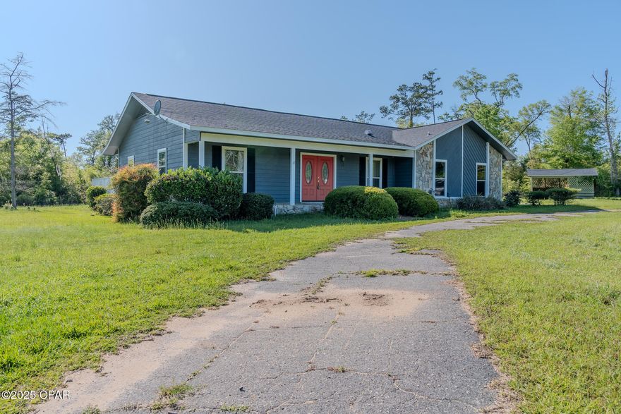 Don't miss this incredible opportunity! This four bedroom, three bath home offers exceptional value in a highly sought-after location. The main home has three bedrooms and two baths. Enjoy modern living with brand new appliances, soaring cathedral ceilings, and a convenient two-car garage. Embrace the tranquility of five acres, relax on the spacious deck, and cultivate your green thumb in the greenhouse. The separate efficiency apartment features a full kitchen with a bed/living area and full bath presents fantastic rental income potential or a private space for guests. Schedule your showing today!''