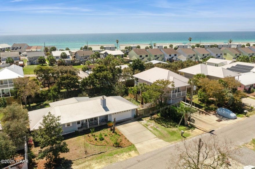 Location, Location, Location!
Just one block from Beach Access 94 on the World's Most Beautiful Beaches, this Panama City Beach gem delivers the coastal lifestyle everyone wants--with NO HOA restrictions.

Walk to the Gulf for sunrise beach days, hop on Gayle's Trails for a bike ride, or head to nearby Pier Park, Topgolf, and the upcoming Pirates Voyage Dinner Show--all just minutes away. Located in one of Golf Magazine's Top 3 Golf Towns in the U.S., you're truly in the heart of it all.

Inside you'll find open-concept living, a bonus room perfect for guests or bunks, and an oversized fenced backyard with fruit trees and plenty of space for a pool or outdoor entertaining.

Short-term rentals allowed, making this an ideal vacation home, investment property, or full-time beach retreat.

Opportunities this close to the beach don't last--schedule your private tour today!