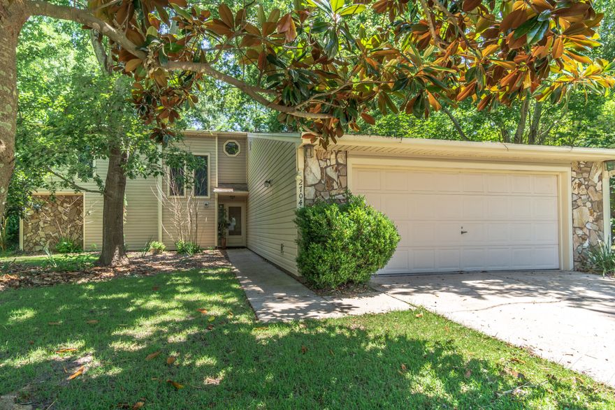 Lovely 4 bedroom 2 bath POOL home on quiet street just off 23rd Street.  The  park-like yard is private with lush landscaping offering shade and places to play and garden.  The master suite on the main floor opens to a deck.  The living room features a wood burning fireplace perfect for cozy evenings.  The breakfast nook has a charming bay window.  A screened back porch with view of wildlife and the pool is perfect for fall and spring meals. Three additional bedrooms, a full bath and a loft area are located upstairs.  One of the bedrooms has its own fireplace.  The owners have loved this home.  Make an appointment to see why! New price below recent appraisal!!