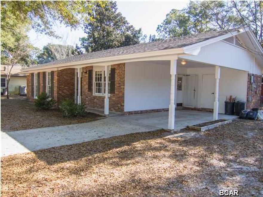Recently remodeled, Brick home centrally located on a big shady lot on a dead end street, right in the middle of town. The home just had a new roof that was stripped and re-nailed for maximum wind mitigation home owner insurance credit. Interior boasts new counters, appliances, lighting (recessed cans in the living room), plumbing fixtures, bath vanities, large ceramic tile through out, new carpet in bedrooms, and all the paint in designer colors. Seller says there is a newer water heater, HVAC (air conditioner), and electrical panel. The neighborhood has many long term residents. Roomy single car carport, with lots of room to park a RV or Boat. Just off the carport is good sized utility room with w/d hookups, and a shed in the back yard. Very affordable home close to all amenities
