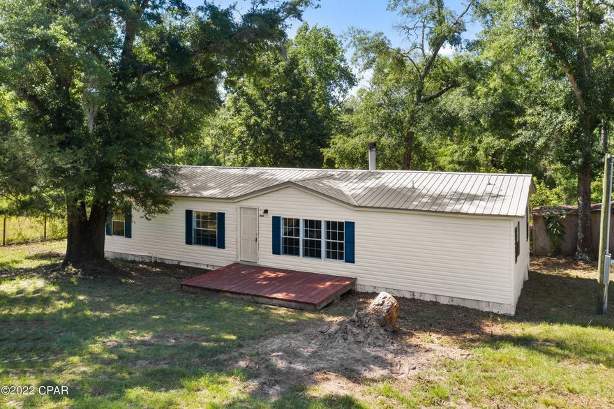 Country living!  This home is situated on over 16 acres.  Home has been updated and is ready for its new owner.  This three bedroom home has a nice covered deck on the back.  The interior of the home has viny plank flooring throughout.  The living area of the home is a nice sized and is just off the dining room.  The kitchen has nice stainless appliances and a desk area.  Master bathroom has a large garden tub, separate shower, and double vanity.