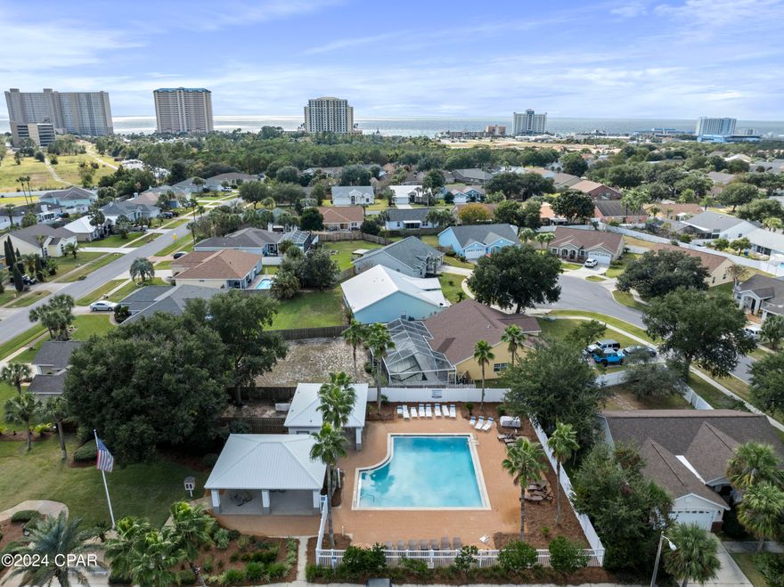 **Under contract, taking backup offers.**
Discover an exceptional opportunity in the heart of Panama City Beach with this stunning 4-bedroom, 2.5-bath home, ideally situated just steps from the beach and adjacent to Pier Park and convenient to all the shops and restaurants in PCB and just a short drive to 30A. Nestled within the sought-after Summerwood subdivision, this residence boasts an abundance of living space, including a large living room, an eat-in kitchen with a breakfast bar, and a versatile office area/bonus area.

The home features elegant tile and laminate flooring, high vaulted ceilings, and arched doorways, enhancing its spacious and airy feel. Enjoy the convenience of a formal dining room and a sunroom that invites natural light. The private backyard, complete with a privacy fence and covered patio, offers a serene outdoor retreat. There is also a community pool to enjoy during the warmer months. This home is waiting for the perfect buyer looking for an amazing location!