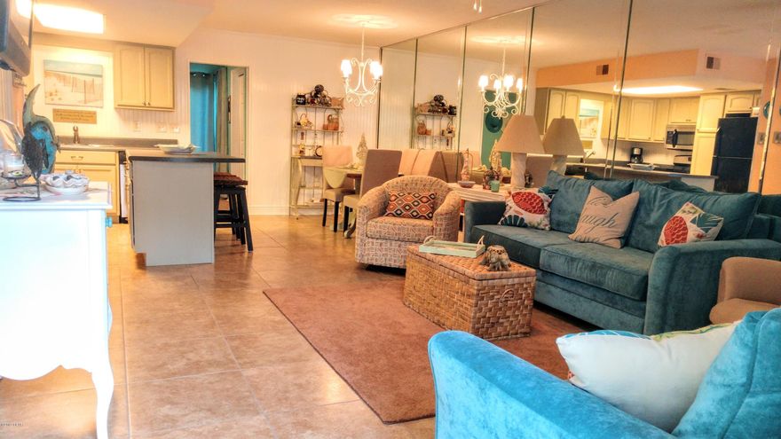 If you are L@@King for a Cute & Beachy 2 Bedroom ''End Unit'' located in a Gated Resort that is WALKING Distance to the BEACH... Here it is! This unit has also had 2 rooms added on, you could have a Downstairs Bedroom. The HOA Dues are only $450 a Quarter NOT a Month and that pays for your  Basic Cable Package, Termite Bond, Household Trash, some Pest Control, Mowing your Lawn, and Lots of Amenities. Speaking of Amenities, there are 11 Pools ''5 Heated'', Shuffleboard Courts, Tennis Courts ''2 Lighted'', an 18 hole Mini Golf Course, Conference Center, Fitness Room PLUS there is a Private Clubhouse with a Snackbar and a Pool directly on the Beach and it is also ''Gated''!!! There is NO Extra Charge to use the amenities.  Age, SF, and Dimensions are approximate... please verify if important.