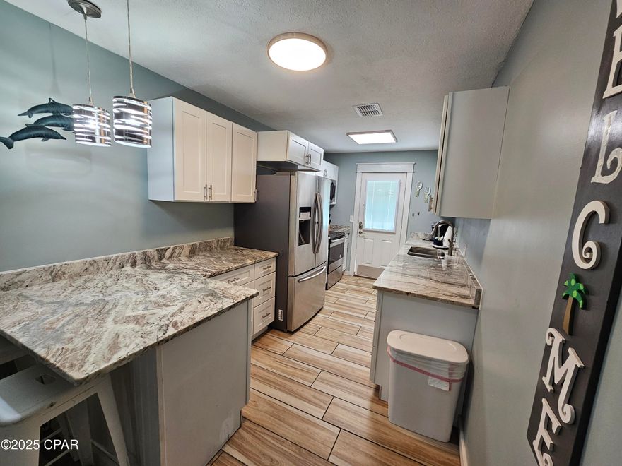 700 Move-in special with security deposit or section 8 on this 2-bedroom 1-bath near Beck Ave and a short walk to the water located near everything. This home has been remodeled, and the kitchen is gorgeous with granite counter tops and SS appliances. The open floorplan with the living and dining area allows open views from the kitchen. The bedrooms are large and because it's furnished the second bedroom has bunkbeds. Custom walk-in shower. If needed all furnished is available. Must see call for tour today.