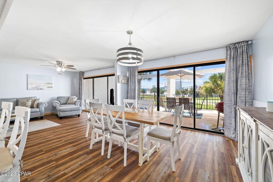 This property has sold! Discover similar listings by reaching out to us for an updated list of available properties that match your preferences.

**RARE OPPORTUNITY TO OWN ONE OF ONLY FOUR EXECUTIVE STYLE GOLF VILLAS IN PRESTIGIOUS EDGEWATER BEACH RESORT - THE ONLY FULL SERVICE RESORT IN PANAMA CITY BEACH**
 
Edgewater Beach Resort provides an unmatched range of amenities in a secure gated community.  Owners and guests have access to a private beach, 11 pools (10 heated seasonally and a tropical beachside lagoon pool complete with lush landscaping, waterfalls and private cabana rentals), four gulf-front hot tubs, a kids' splash pad, an executive par-3 golf course, 10 plexicushion tennis courts, 5 pickleball courts, 10 shuffleboard courts, basketball court, full fitness center, onsite dining at Ocean's Restaurant, Edgie's market (Starbucks), electric car charging stations, trailer/boat/rv parking and a tram service.  The Shoppes at Edgewater are just across the street where you can dine at the highly rated Firefly restaurant, treat yourself to Bella day spa or spend the day at Rock'It Lanes with bowling, skating and arcade fun for everyone.  You will find even more dining and entertainment within just a short drive to Pier Park or Frank Brown Park.  There is truly something for everyone and the resort is pet-friendly for owners so even the fur-babies are not left out.

Edgewater Golf Villa #205 is an end unit in a low density building conveniently located near the entrance, pool, mailbox, club amenities, and beach walkover.  This 2BR/3BA unit boasts over 1,800 sq. ft. in a 2-story open floor plan, making it ideal as a primary residence, a seasonal home or a rental machine.  This unique floor plan has three outdoor seating areas, including an oversized patio extending the entire length of the living and dining room.  Walls of windows on the 1st and 2nd floor allow for natural light to flow throughout and a scenic view of the golf course's 8th hole where you can take in the natural beauty of the biodiversity found around the pond (turtles, frogs, seagulls, egrets, ducks, etc.).
 
Inside, the unit has been tastefully upgraded with designer textured ceilings, modern lighting, solid wood doors and easy-to-maintain WPC luxury vinyl flooring throughout.  The kitchen includes all new SS appliances, quartz countertops and a herringbone marble backsplash.  All three bathrooms have been renovated and the extensive master en-suite includes an extra large double vanity, standalone soaker tub and a separate shower.

These exclusive units rarely become available for sale.  Don't miss your chance to experience all that Edgewater Golf Villa #205 and Edgewater Beach Resort have to offer.  Contact us today to arrange a viewing before it's too late!