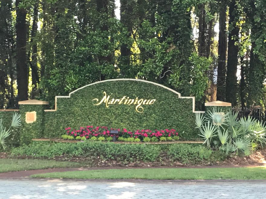 This is a Side Yard Lot located in Martinique.  This first class Waterfront Community in Panama City Beach is a  gated community of custom built homes with old-Florida style architecture! Each home is designed by an architect and custom built to suit your needs and last a lifetime! High building standards are implemented to ensure the quality & efficiency of your future home! Landscaping standards are designed to make the most of this extraordinary location! Wild deer & ducks frequent Martinique and are a testament to the natural serenity this location provides. The community pool, children's playground, & park pavilion overlook the main lake of Martinique. The scenic walking trail wraps and intermingles throughout the community. Martinique is only 5 minutes from the Gulf & sunny beaches, St. Andrew's State Park, award-winning restaurants, & marinas! If you are a beach-lover, boat-lover, or a lover of nature you will absolutely LOVE making Martinique your home!