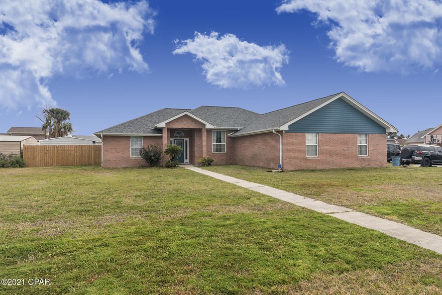 'CURRENTLY UNDER CONTRACT, SELLER ACCEPTING BACKUP OFFERS' Beautiful Home on Large Corner Lot!! Minutes to Tyndall AFB, convenient to shopping and restaurants. This spacious home has a split floor plan, a bonus game/living room , a formal dining area and gorgeous master suite. The master bath has been totally updated with new tile, his & her sinks, tub surround and more. New Luxury Vinyl Plank throughout most of the home. The kitchen is spacious with brand new top of the line KitchenAid double oven, microwave, new dishwasher, a gas cooktop with tons of counter and cabinet space, a breakfast bar as well as a breakfast nook. The ample backyard is completely fenced and has a storage shed. The garage is very large with tons of built in storage cabinets. Many other features such as the  a grand great room with high ceilings and so much more. This is truly one of the best designed homes. With built in storage areas, no space is wasted.

Shed is damaged and needs repair.

All measurements are approximate please verify if important.