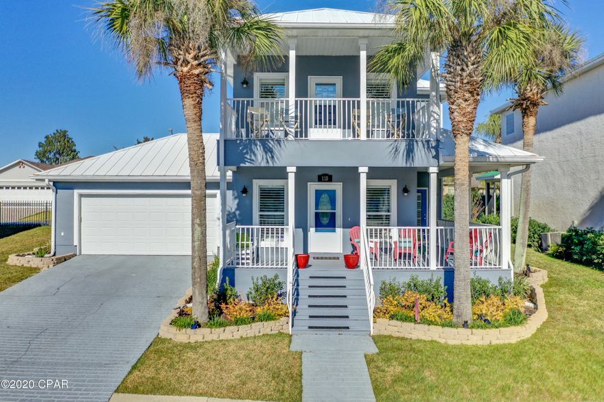 FURNISHED AND MOVE IN READY!! Beautiful Beach House Located Across The Street From The Gulf and White Sandy Beaches of Panama City Beach. The Property Offers 3 Bedrooms and 3 Bathrooms With a 2 Car Garage. Updated Kitchen With Quartz Countertops and Waved Textured Back-Splash. -110 Smugglers Cove is an updated modern, smooth stucco finish two story home with a metal roof. 2019, installed new 9 inch luxury vinyl plank floors and all new stainless appliances. Also, freshly painted interior and exterior of home. In addition to huge Master Suite with walk-in closet, separate shower and soaker tub, it also has 2 extra bedrooms - one upstairs, one downstairs - each with its own full bathroom. A newer HVAC system replaced in 2015, gutters , and a fantastic neighborhood with a private street just a block from the beautiful white sand beaches of panama city beach.