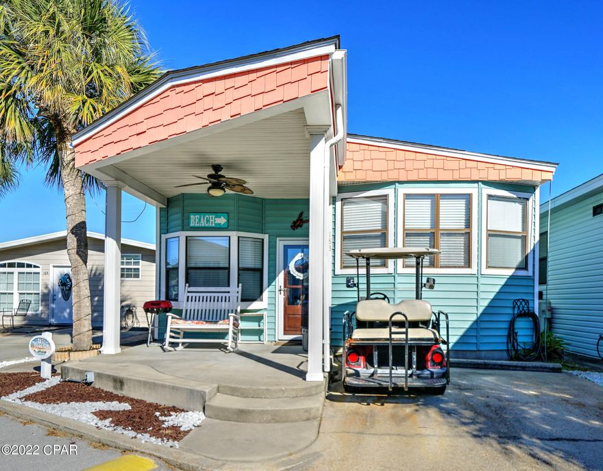 Check out this 3 bedroom, 2.5 bath Venture Out Beauty! This home has a great open floor plan and flows beautifully. Good size living room and kitchen. Owner has recently updated furniture, flooring and decor. Relax after a long day on the beach under the large, covered porch! Perfect second home or make this a short-term rental investment! Venture Out offers BOTH beach and bay access... The resort has 2 pools, tennis, golf, shuffleboard, playground, basketball, fishing pier, boat dock with slips & boat ramp. Venture Out is a golf cart community that has exploded in popularity within the last few years. A gated, pet friendly community that's great for full time residency or just to vacation. 24-hour security & friendly atmosphere!