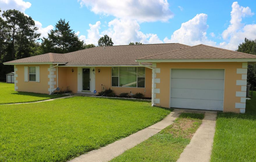 ''The prettiest street in Sunny Hills.'' Wonderful curb appeal! This gorgeous cul-de-sac home has tons of upgrades and renovations! Almost 1 acre lot and includes a sprinkler system; new, deep, yard well; sidewalk; and beautiful views. The owners have taken excellent care of this home. From entry, you will love the XL living room with an almost full wall of sliding glass doors that lead to the gorgeous Florida room. The FL room has large windows to take in spectacular views of the expansive back yard and 300 sq ft not included in the listed sq ft. Light abounds in the renovated kitchen with an island and new ceiling spotlights. Other home features include new granite countertop in master bath, security system, newer windows throughout, new roof, blown-in insulation, and a termite bond. Sunny Hills has several lakes, boat launches, an 18 hole golf course, and a clubhouse. It is located within 12 miles to the interstate and 45 minutes to "The World's Most Beautiful Beaches" of Panama City Beach and the international airport.