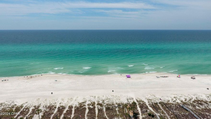 'CURRENTLY UNDER CONTRACT, SELLER WILL CONSIDER BACKUP OFFERS' West Panama City Beach Gulf front townhome 2 beds/2.5 baths and 18 linear feet on the Gulf of Mexico. Enjoy the beautiful views of the beach and stunning sunsets from the Trex deck. The lower decks offer covered and open areas for grilling and gathering, plus an outdoor shower. The second floor consists of the main living area, complete with kitchen, dining, living and a half bath, and spectacular beach views from inside and outside on the Trex deck.  The third floor offers two bedrooms, two bathrooms, laundry closet, AC, water heater and owner's closet. Enjoy waking up to a view of the beach from the primary bedroom.  Beachside West is a smaller gulf front complex of only 15 units.  There's no HOA and no dues or fees. It's Fee Simple, you own the land and the unit.  Freshly painted exterior Spring 2024, new roof 2023, new upper and lower decks in 2022.  The two car garage could be converted in to living space, bedrooms, etc and still maintain a single garage or storage area.  This is a great opportunity to own a desirable property in an ideal location on Panama City Beach. 
Buyer to verify measurements if important. 
Golf cart and items in garage don't convey.