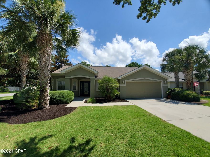 Located in Desirable Palmetto Trace Neighborhood - Community Pool - 2 Car Garage - Lawn Service Included!For rent. 3 Bedroom, 2 bath home with quick access to Pier Park. The home features a spacious living room with great natural lighting and sliding glass door to the back patio. The kitchen overlooks the living room and offers a breakfast nook and plenty of cabinet and counter space. Large master bedroom with en suite bath offering his/her separate closets, large soaking tub and double vanity. Formal dining room; 2 car garage with large driveway. Rent includes lawn service, sprinkler water, and trash service. **Small pets negotiable with $250 non-refundable pet fee.